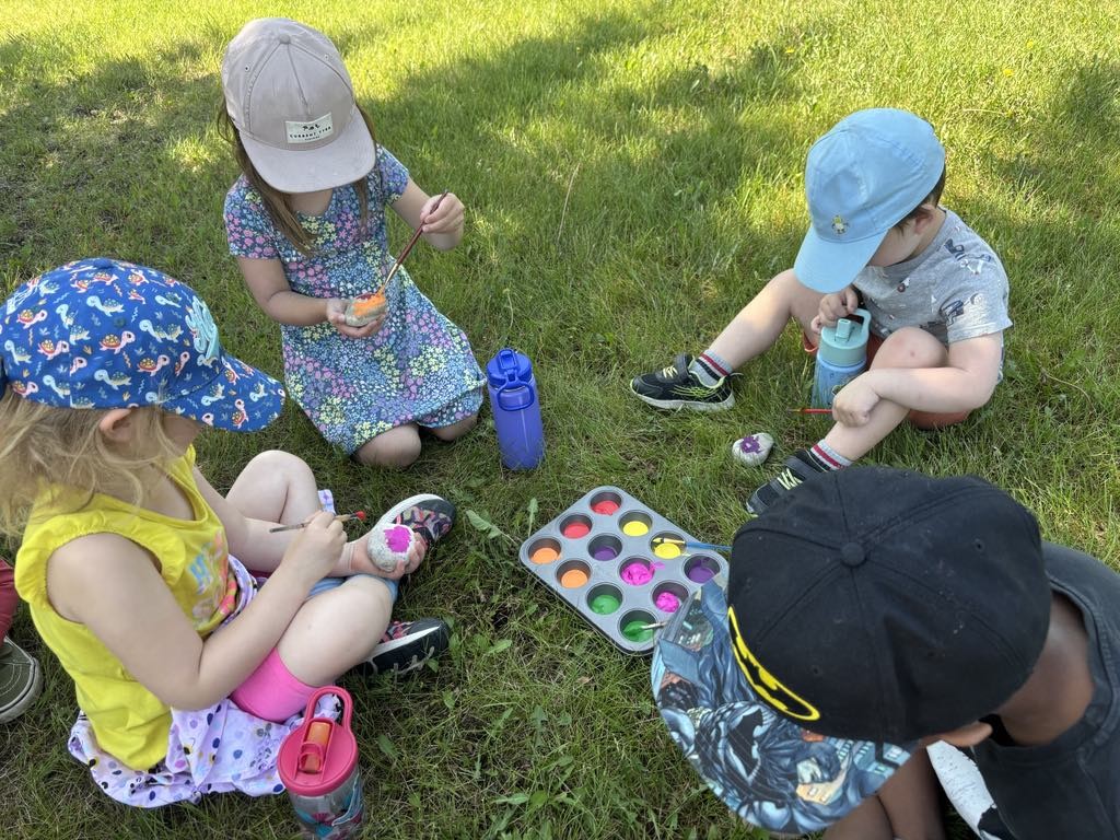 Kids painting outside